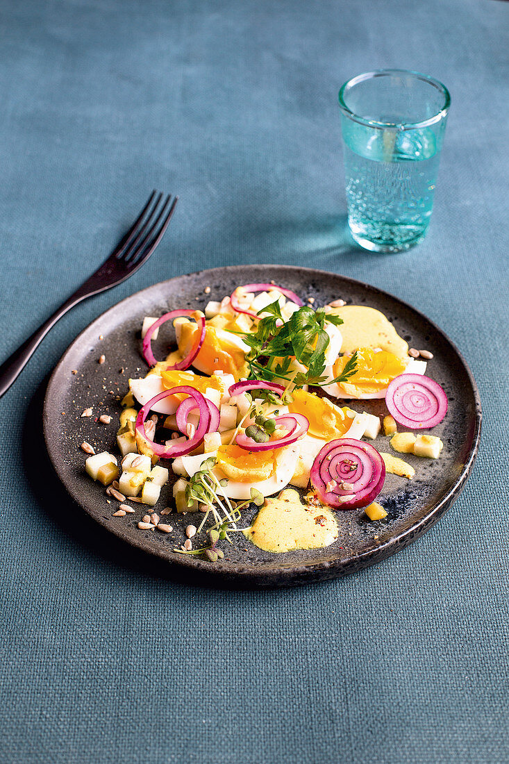 Egg salad with apples, red onions and seeds