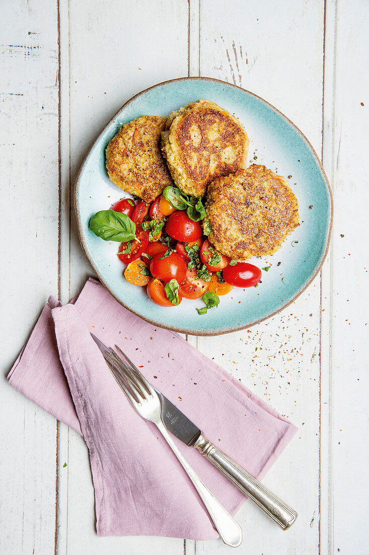 Seeded millet fritters with tomato salad