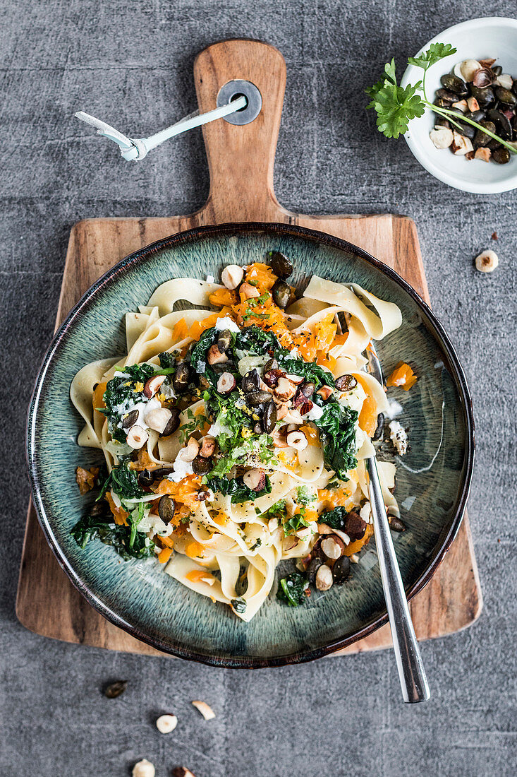 Tagliatelle with pumpkin, spinach and goat's cheese