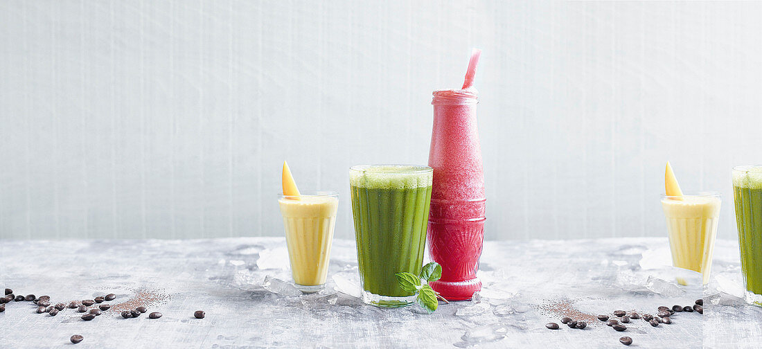 Yellow, green and red smoothies