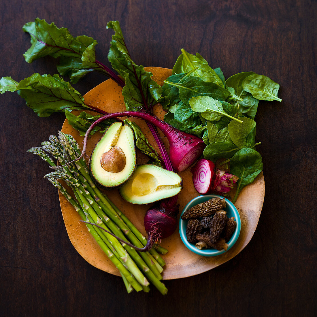 Fresh spring vegetables, avocado and morels