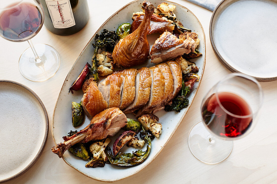 Platter of duck with root vegetables