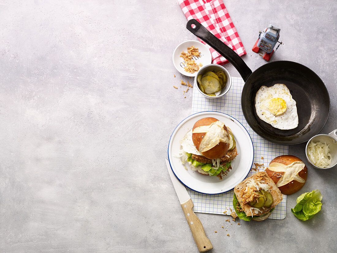 Leberkäse (beef and pork meatloaf) burger with coleslaw and gherkins