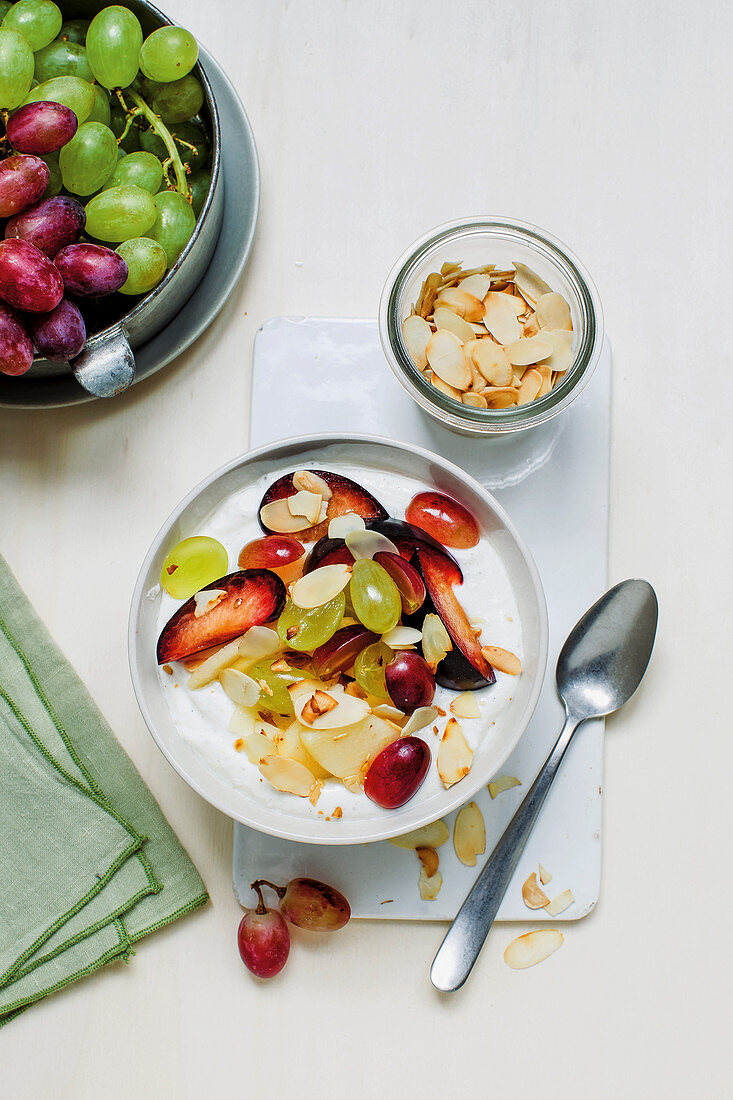 Marzipan quark with fruit and flaked almonds