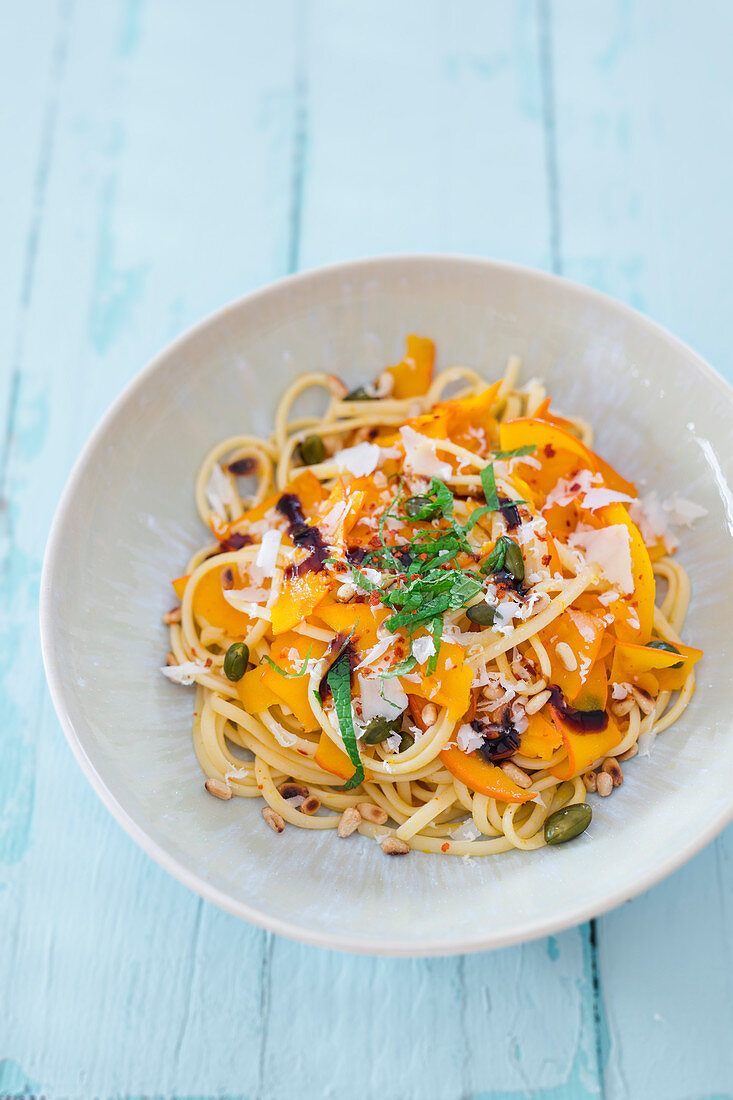 Linguini with pumpkin, pistachio nuts, pine nuts and Pecorino cheese