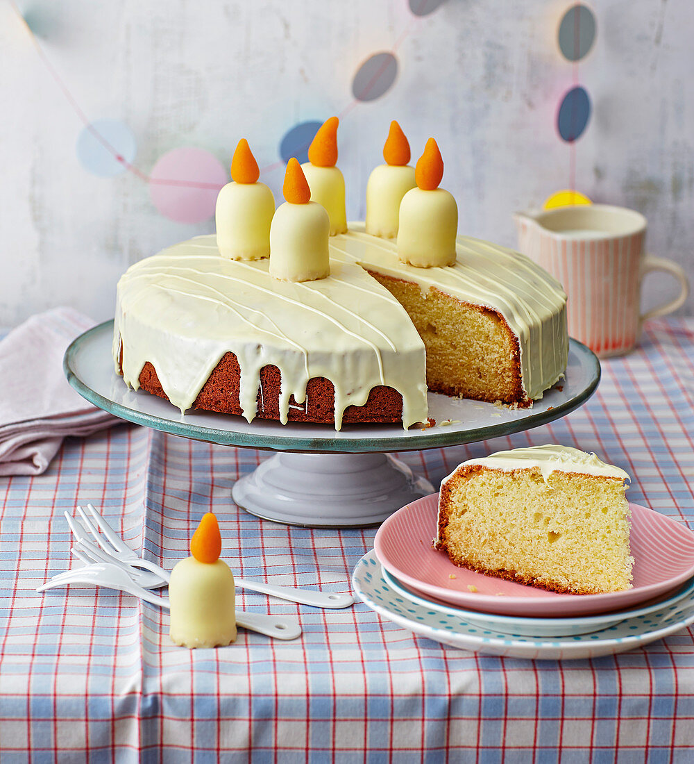 A birthday cake with white chocolate marshmallow candles