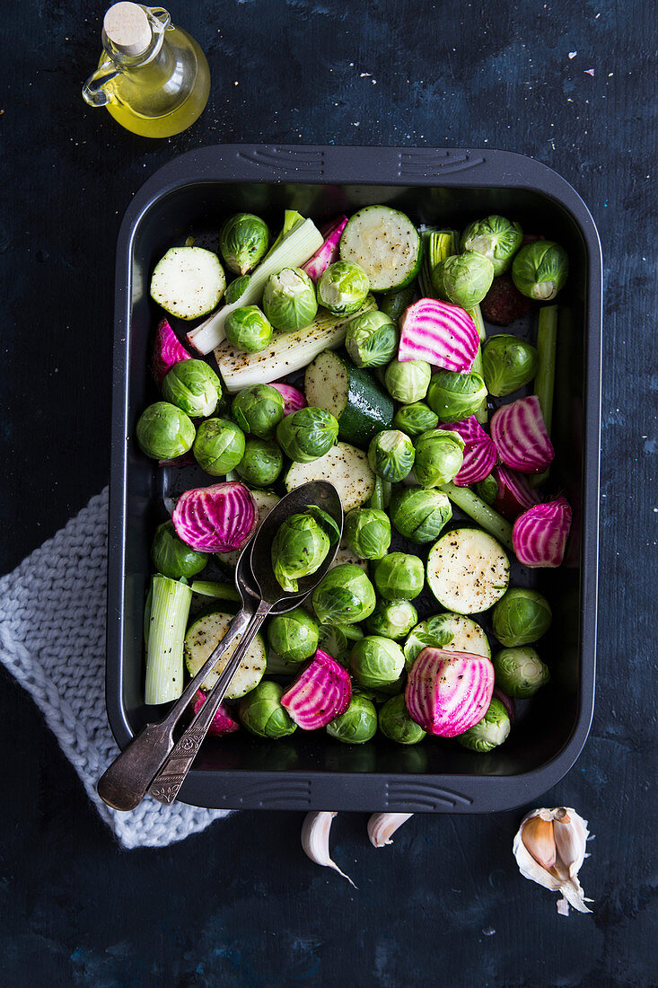 Raw vegetables in a roast tin