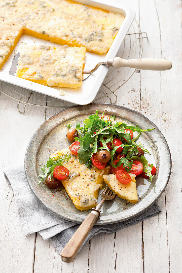 Polenta with gorgonzola on a baking tray