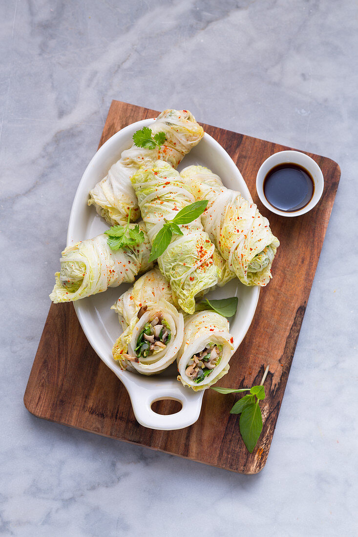 Oriental Chinese cabbage rolls with shiitake mushrooms and mung bean shoots