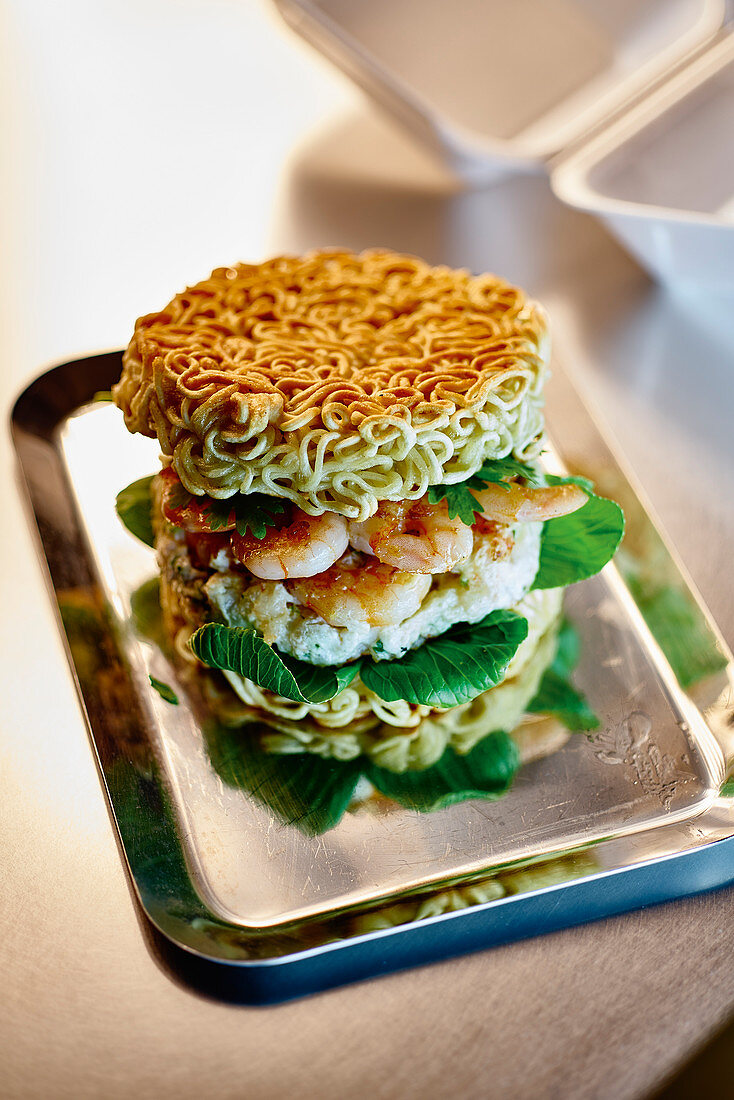 Ramen noodles as burger buns with a prawn patty to take away