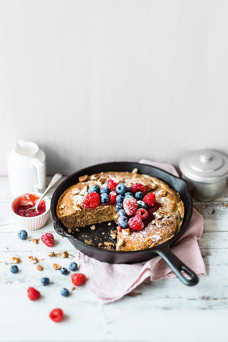 Chocolate cheesecake with berries in a pan