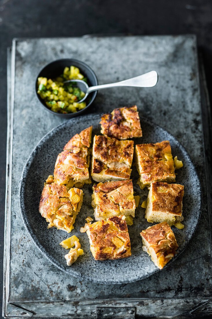 Pan-fried pineapple curry cake with spicy chutney