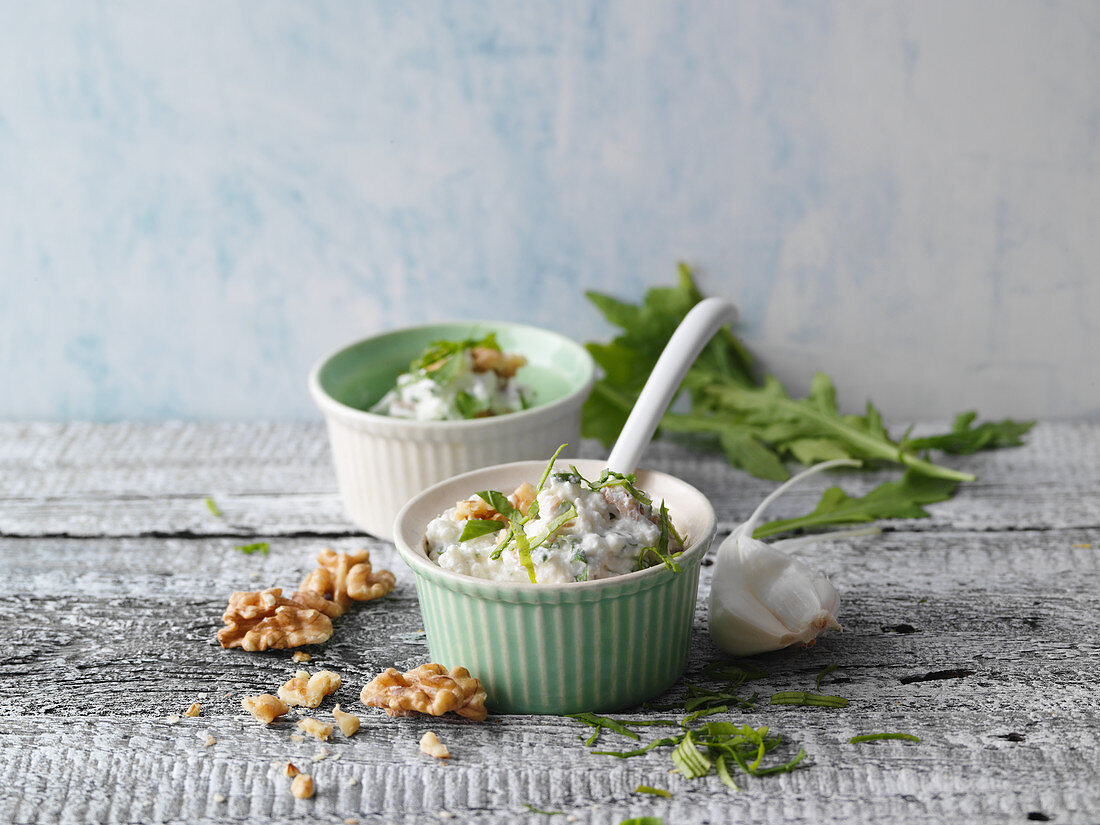 Cottage cheese with walnuts, feta cheese and rocket