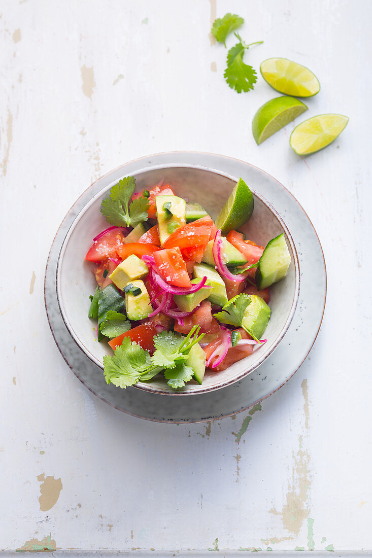 Beefsteak tomatoes with avocado and cucumber