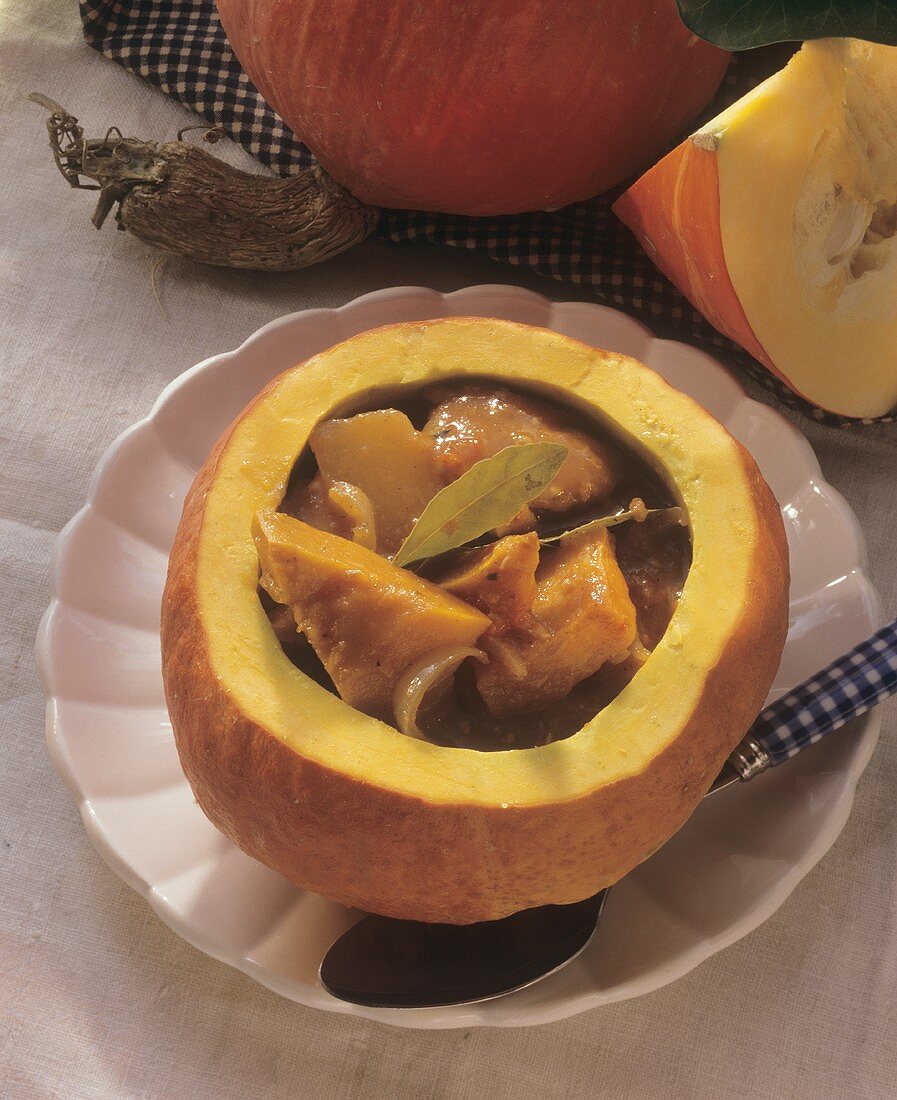 Rabbit and Pumpkin Stew Served in a Carved Out Pumpkin