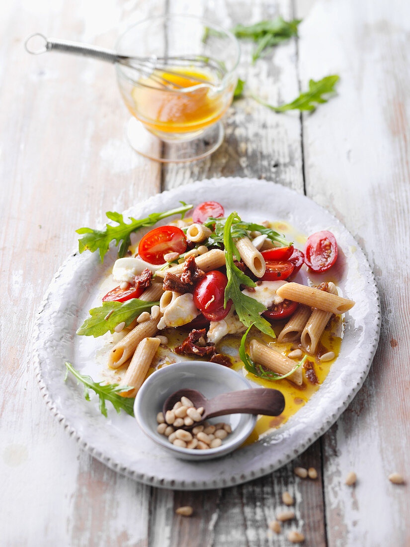 Italian pasta salad with rocket and pinenuts