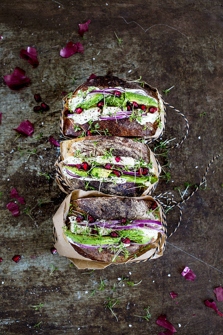 Avocado sandwiches with pomegranate seeds