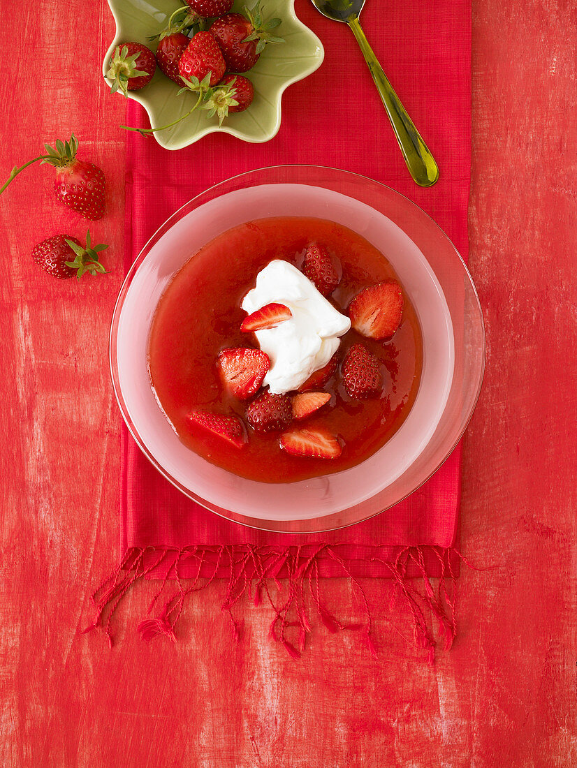 Cold strawberry soup with coconut foam