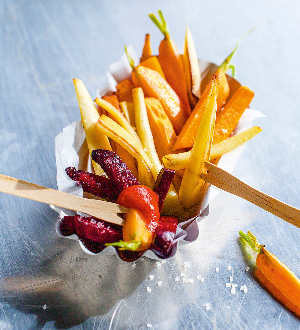 Colourful vegetable oven fries with ketchup