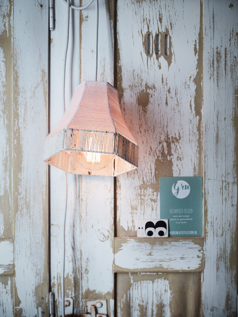 A homemade lampshade made from wool