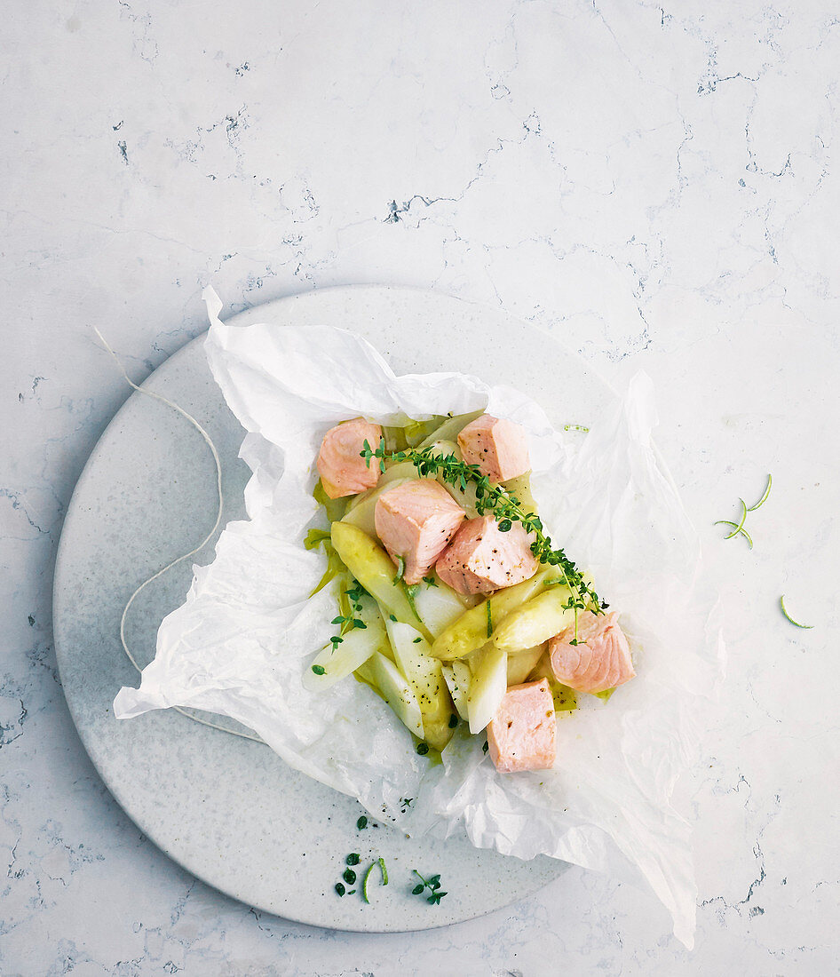 Salmon and white asparagus in parchment paper