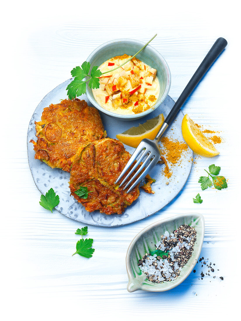 Green vegetable frittes with curried banana sauce and lemon