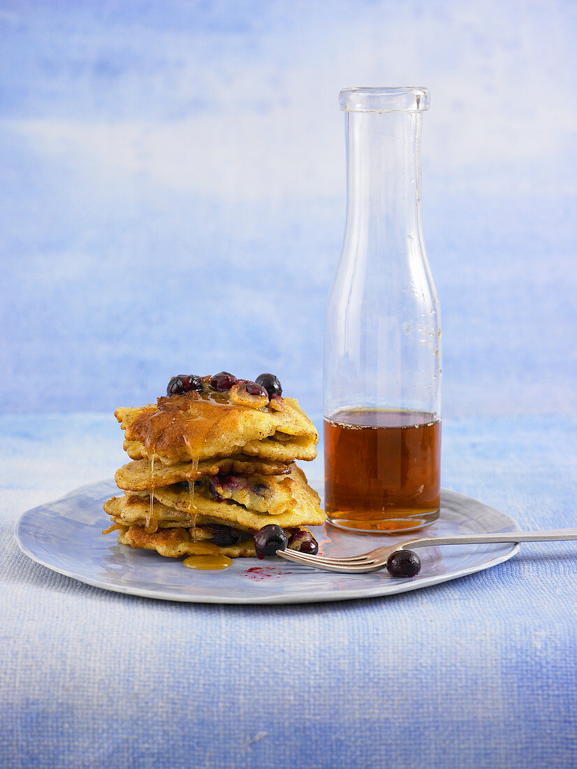 Blueberry pancakes with maple syrup