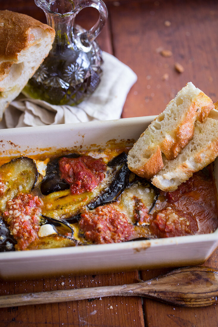 An aubergine bake with white bread