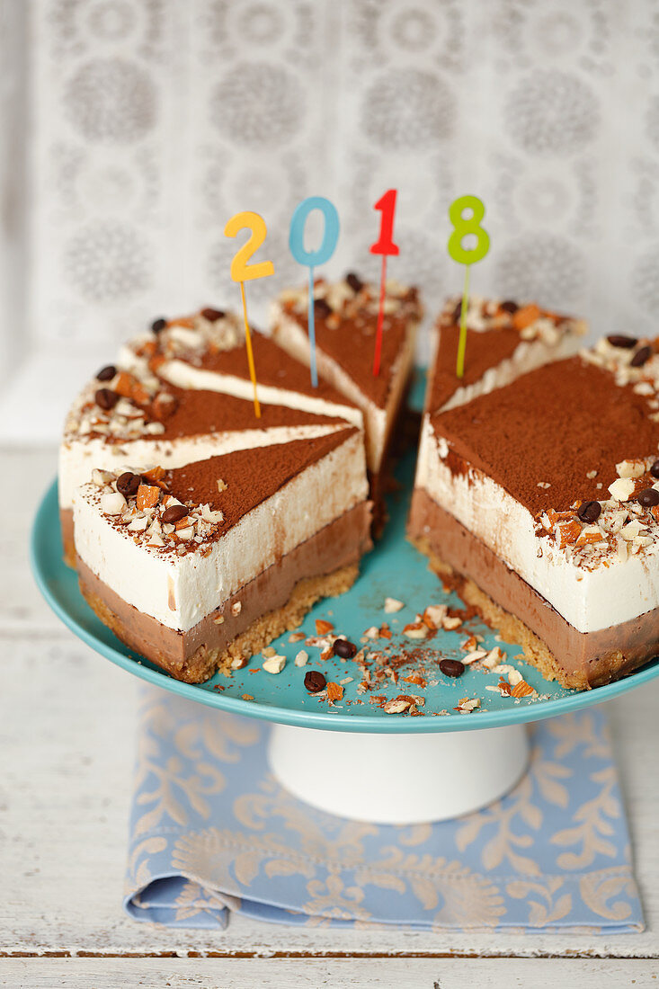 Chocolate cream cheese cake decorated with a year