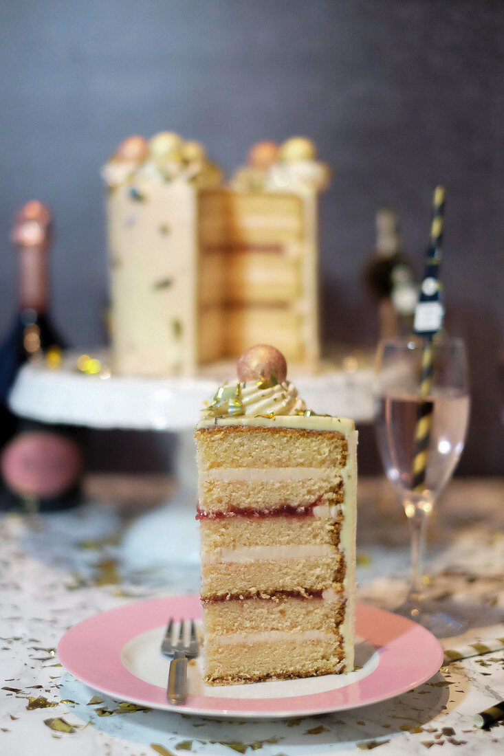 A New Year's Eve cake with champagne, sliced