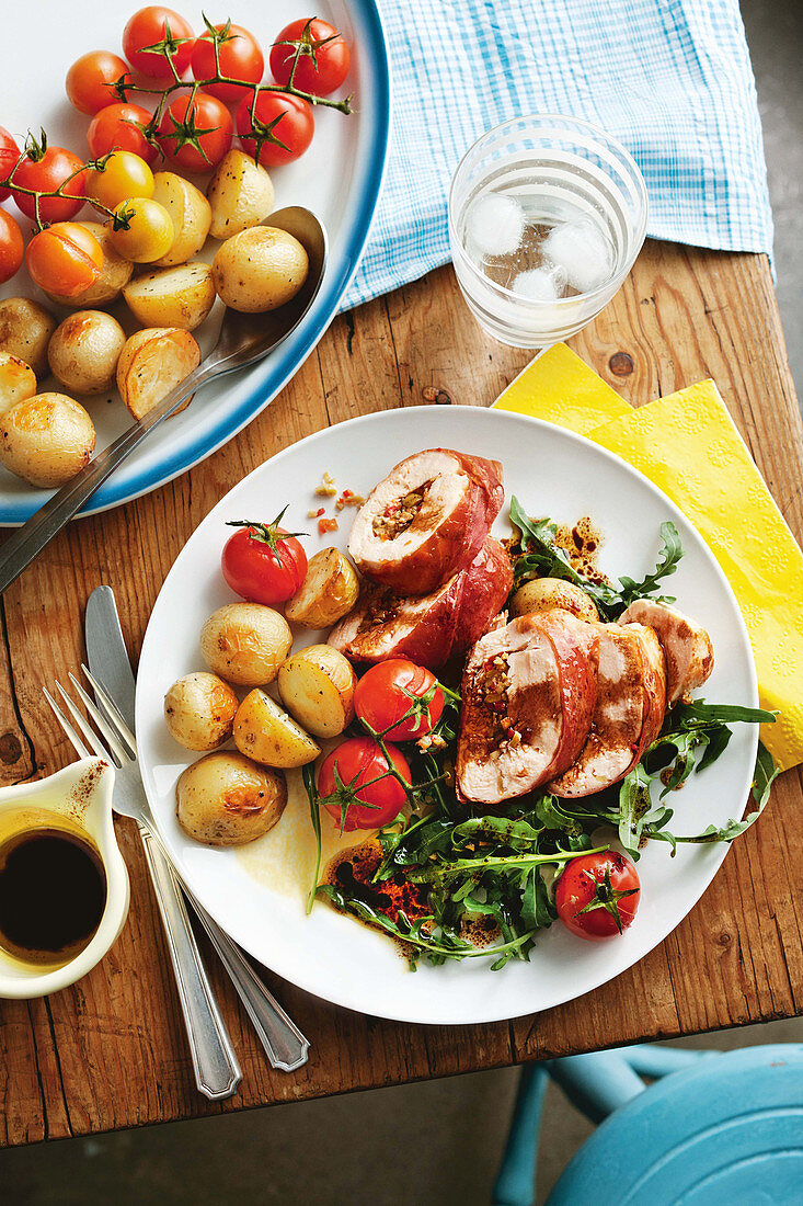 Olive-stuffed chicken breasts with chat potatoes