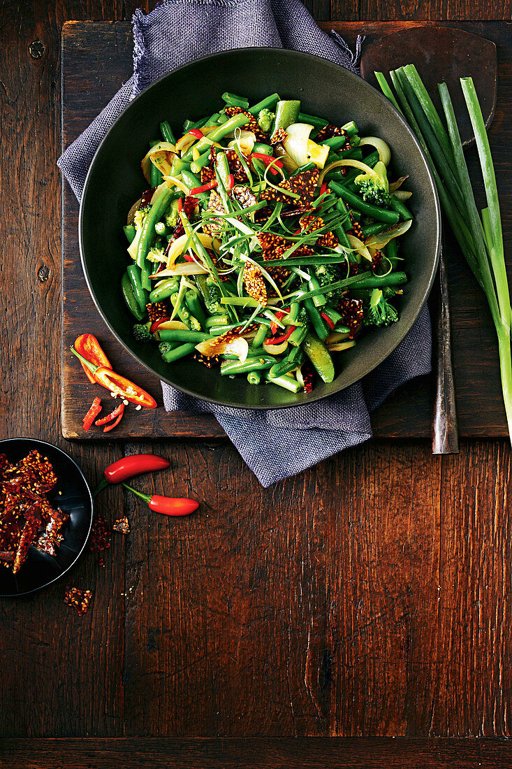 Bean, broccoli and sugar snap stir-fry with sesame brittle