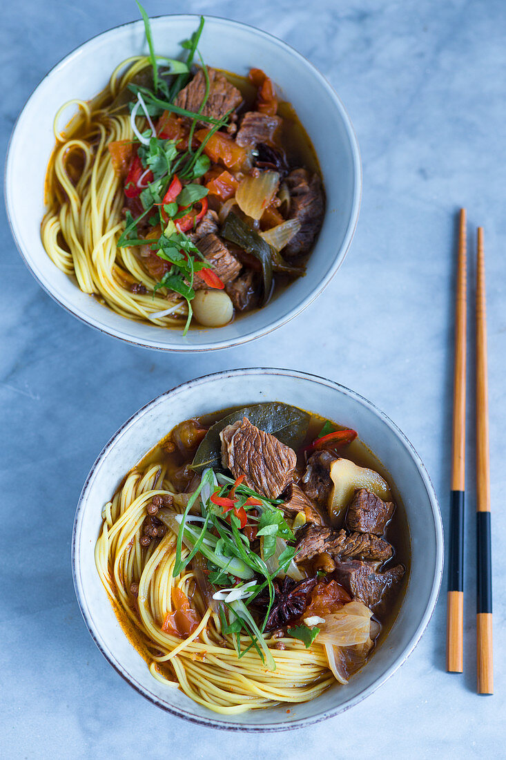 Asian noodle soup with beef and vegetables