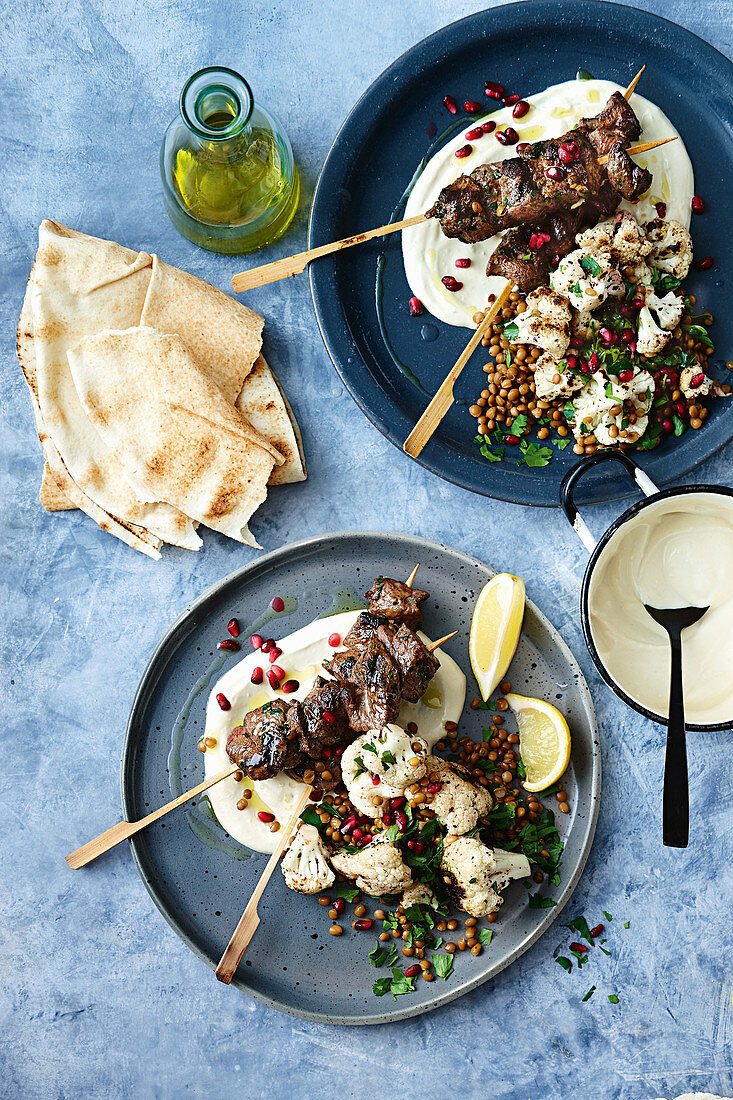 Lebanese skewers with charred cauliflower and lentil salad