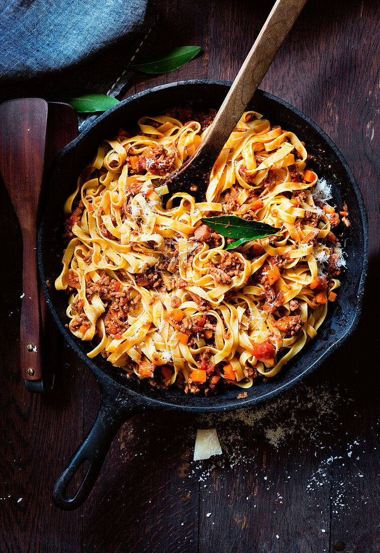 Tagliatelle bolognese in a pan