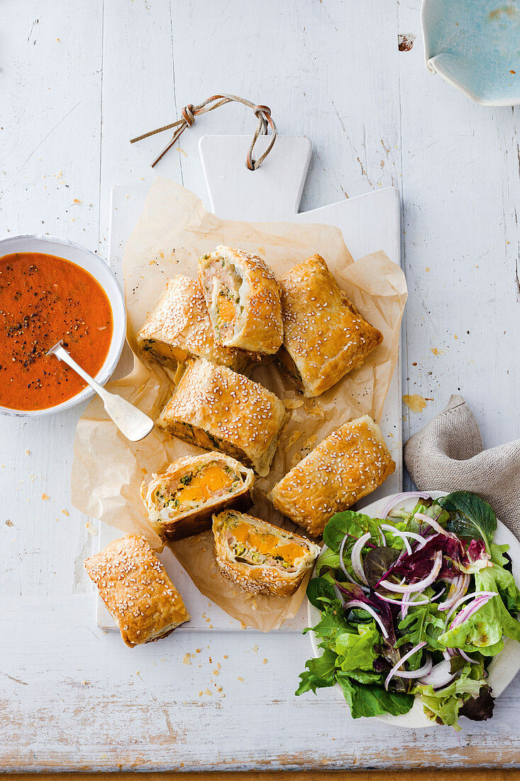 Pork and pumpkin sausage rolls with spiced tomato sauce