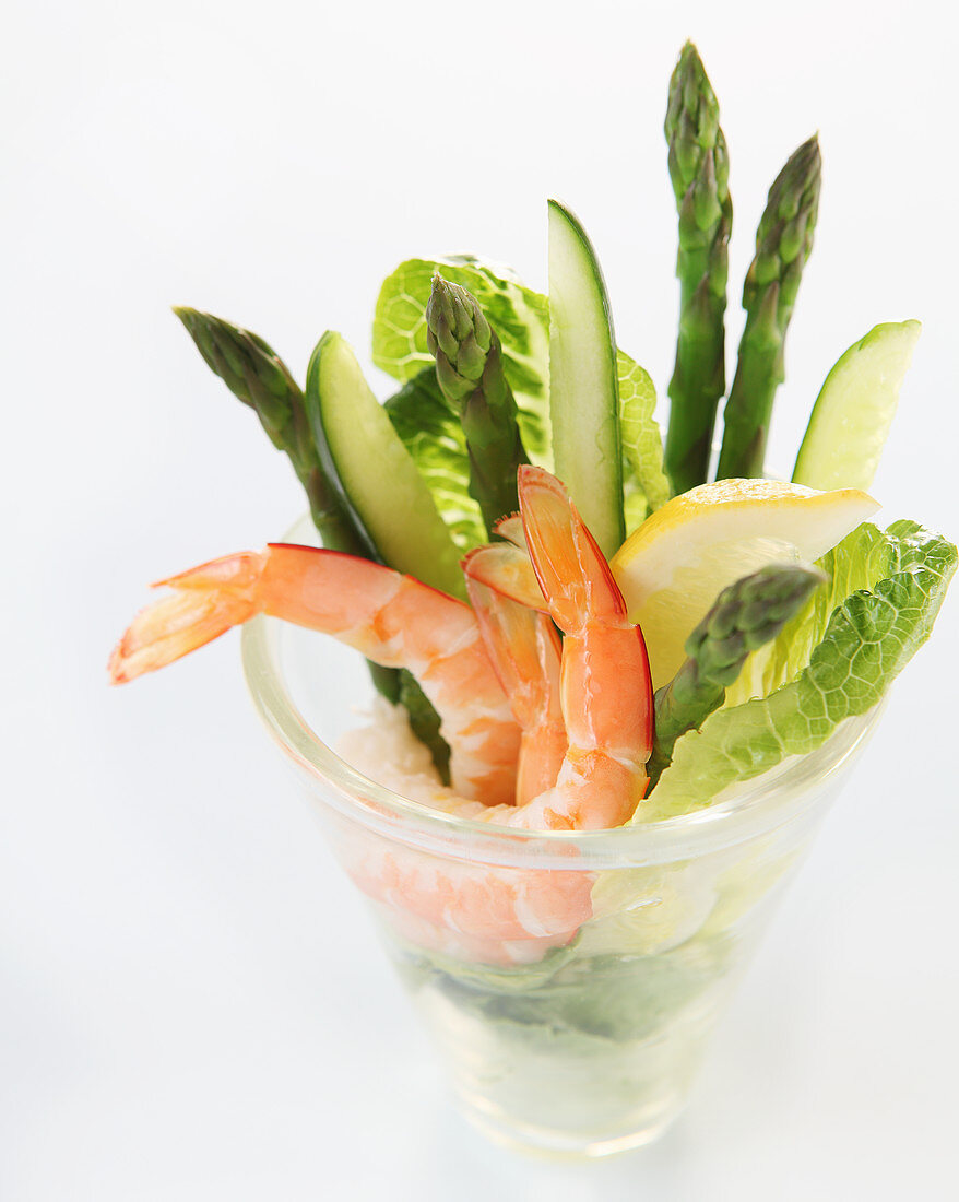 Shrimp cocktail with green asparagus and cucumber