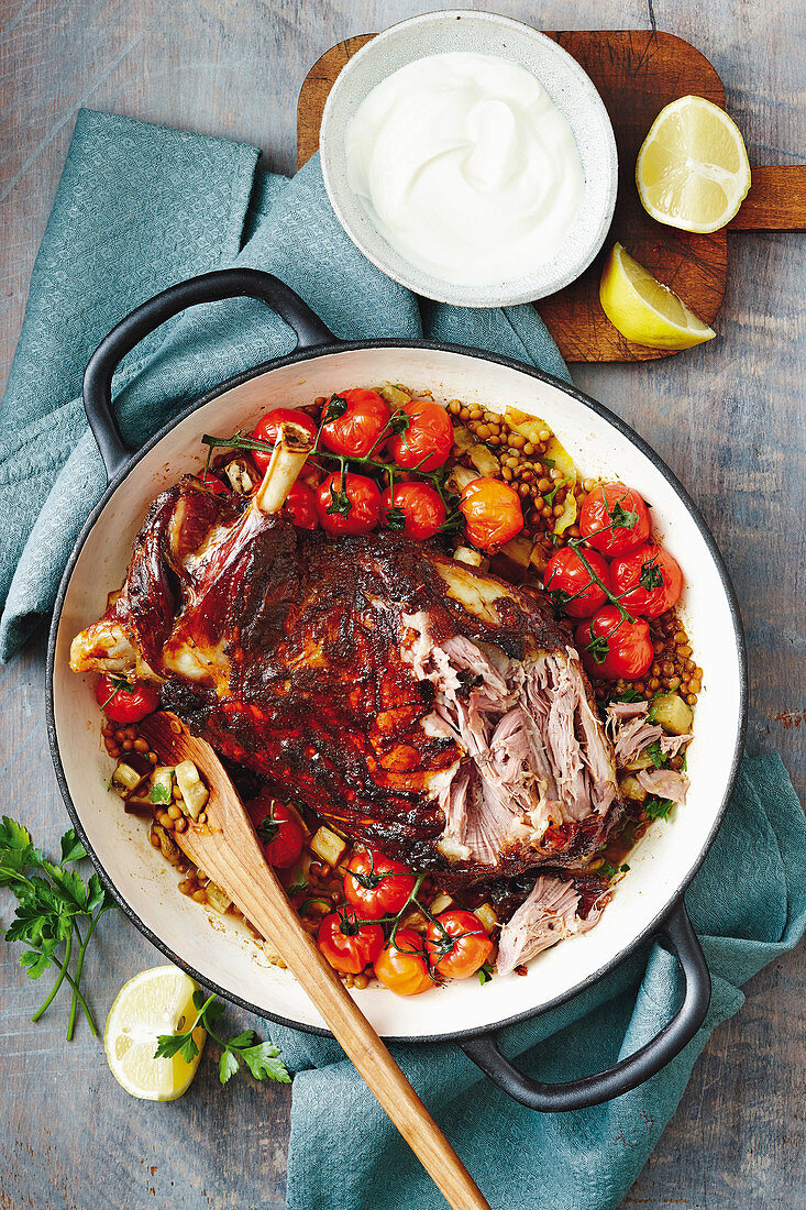 Slow cooked north african roast lamb with lentils