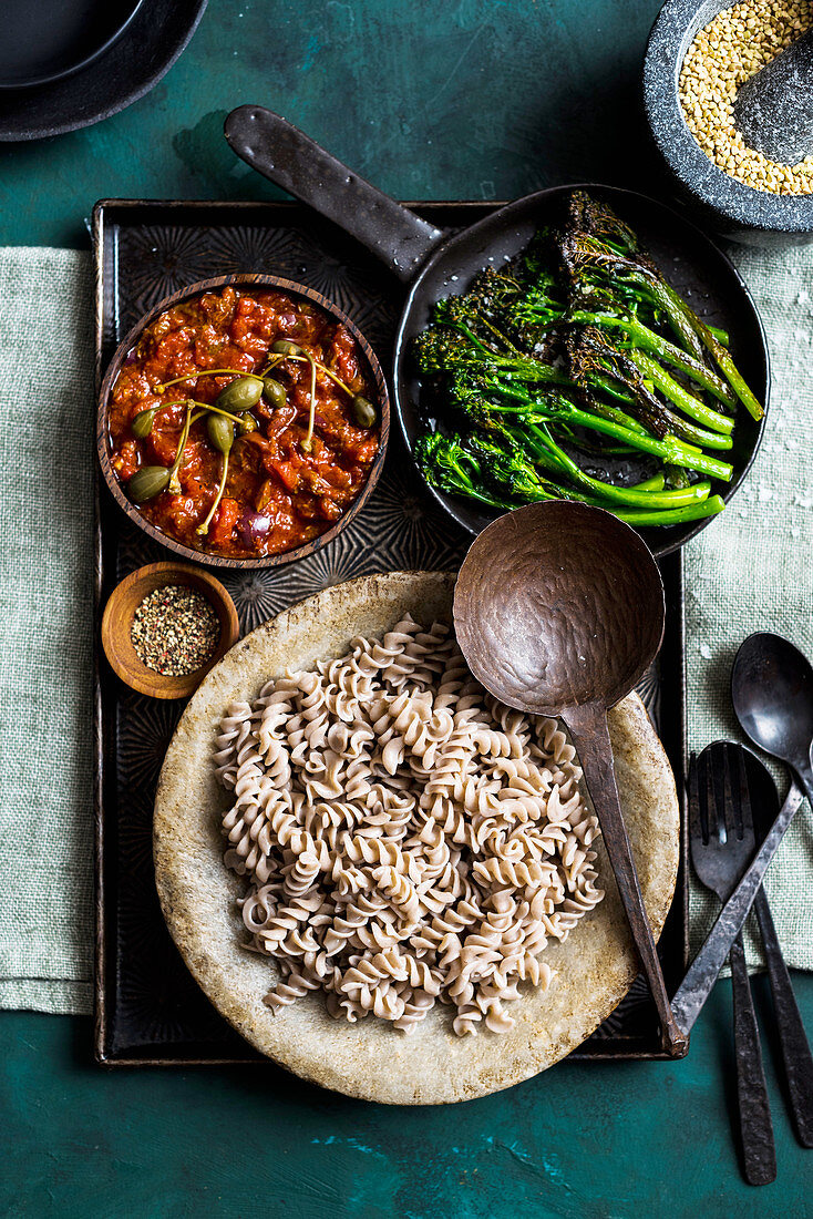 Buckwheat pasta with vegan putanesca sauce and grilled broccolini (vegan)