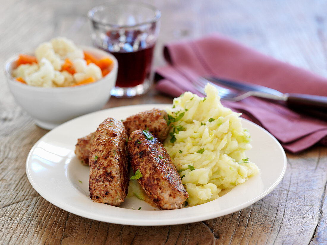 Mustard sausages with colcannon potatoes