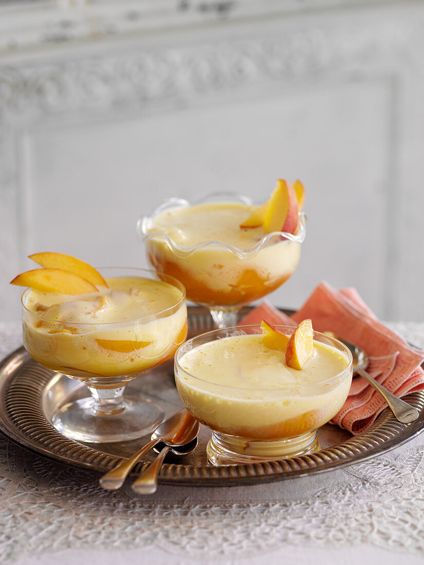 Zabaione desserts with peaches