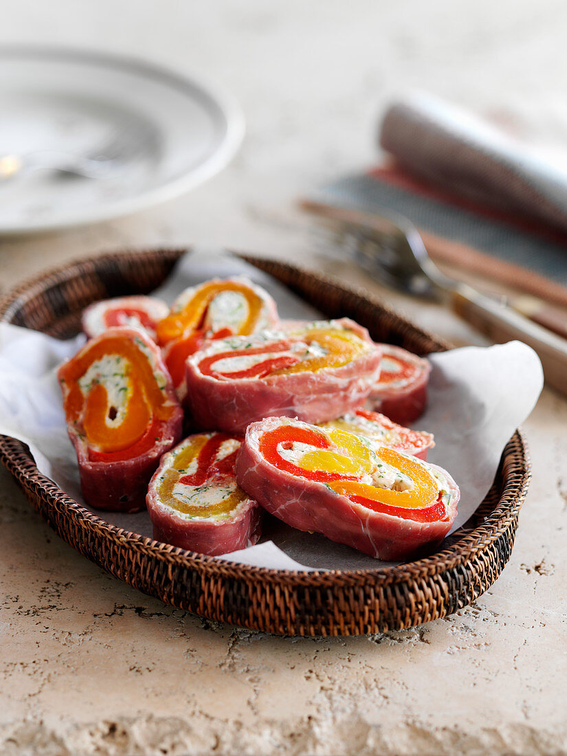 Spicy pinwheels made of ham, cream cheese and peppers
