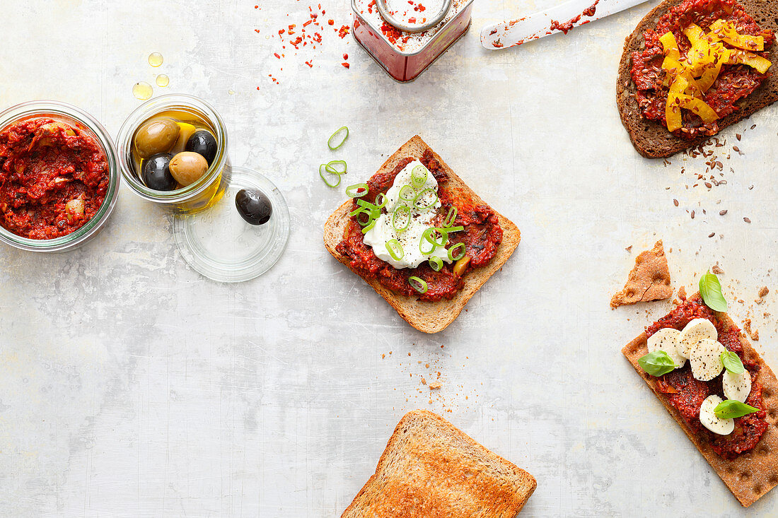 Spicy sandwiches with a trio of olive and tomato spreads