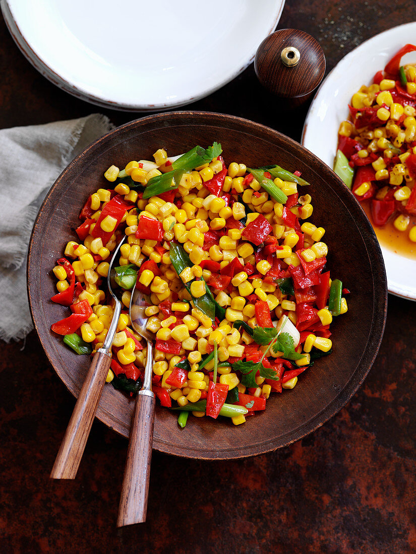 Sweet corn with spring onions and roasted red pepper