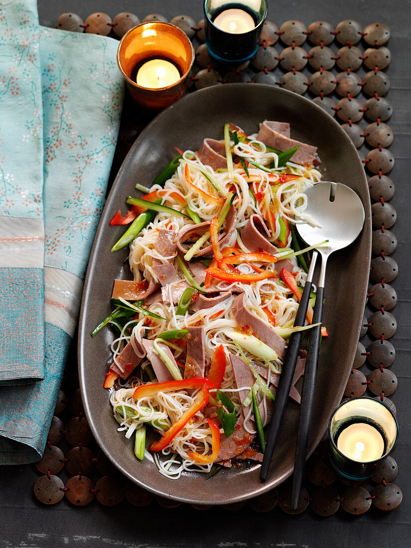 Warm rice noodle salad with beef