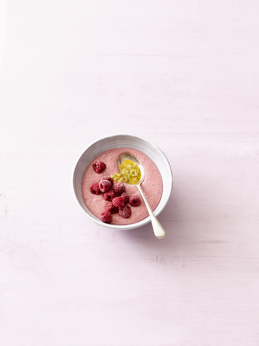 Amaranth porridge with raspberries and passion fruit