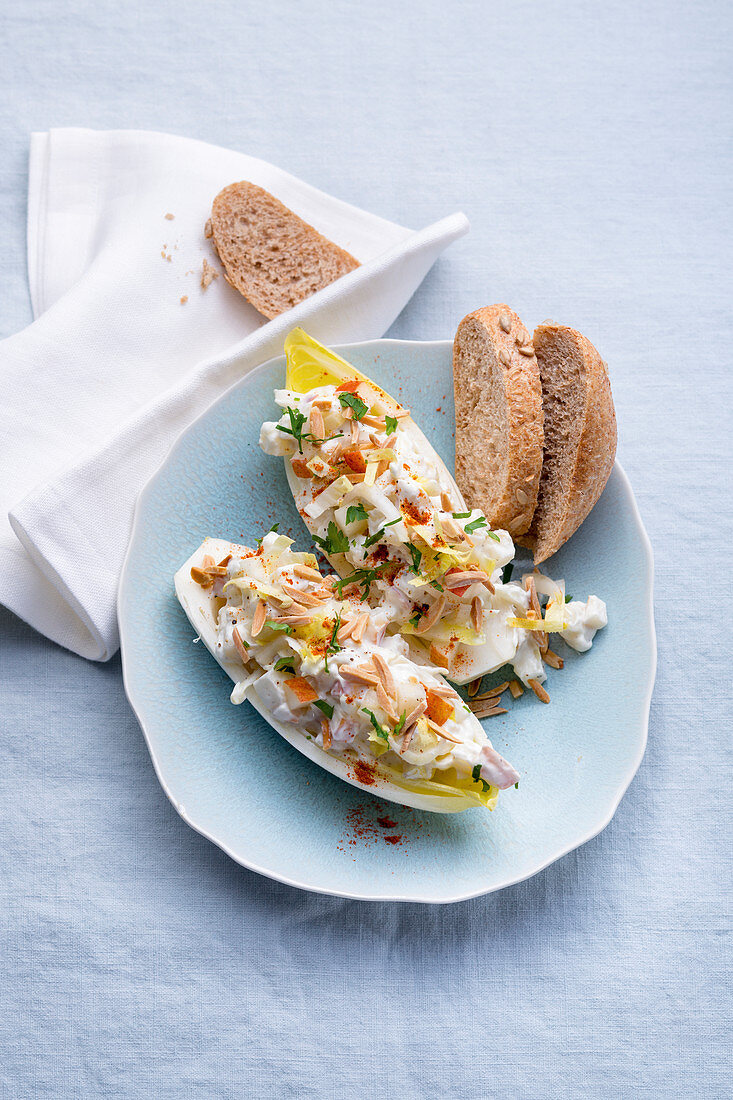 Chicory boats filled with pear and almonds