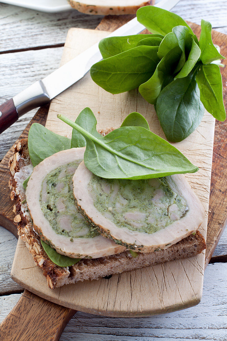 Rolled chicken breasts stuffed with spinach and chicken meat