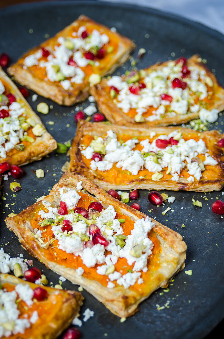 Butternut squash, feta, pistachio and pomegranate seeds tarts