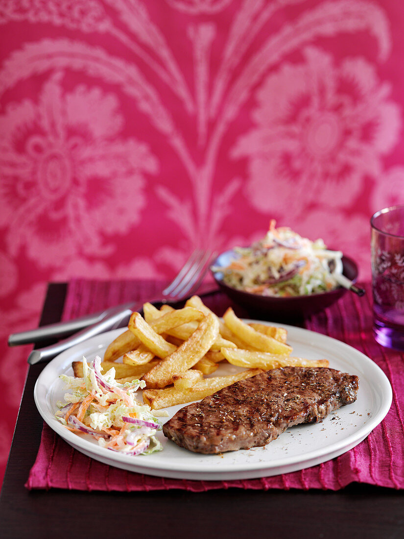 Steak with chips and coleslaw